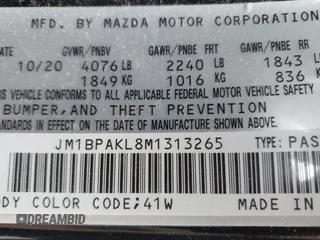 2021 Mazda 3 Select с VIN JM1BPAKL8M1313265, выставлен на аукционе IAAI как лот 39937954 с пробегом 77 446 миль миль и . История ставок и продаж доступна на DreamBid. Изображение 9.