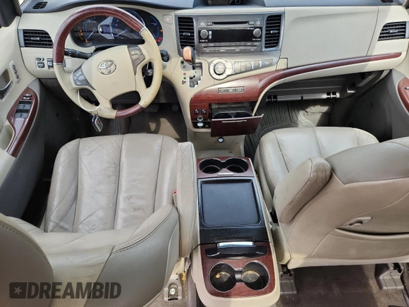 2011 Toyota Sienna XLE AAS with VIN 5TDYK3DC5BS081015, listed as a Copart auction lot 61096595 with 291,855 mi miles and Salvage title. Bid and sale history available at DreamBid. Image 8.