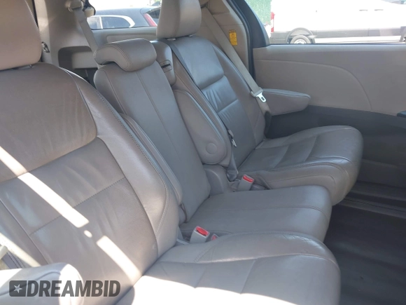 2014 Toyota Sienna L with VIN 5TDZK3DC9ES518653, listed as a IAAI auction lot 42767591 with 261,730 mi miles and . Bid and sale history available at DreamBid. Image 8.