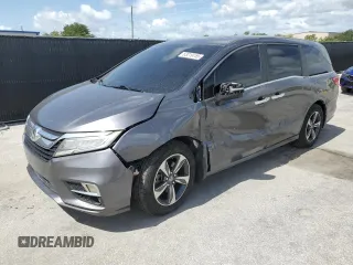 2018 Honda Odyssey Touring with VIN 5FNRL6H83JB044315, listed as a Copart auction lot 63219155 with 141,612 mi miles and Salvage title. Bid and sale history available at DreamBid. Image 1.