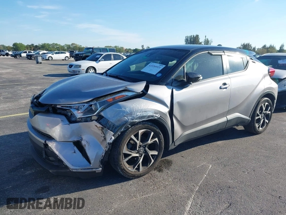2019 Toyota C-HR XLE with VIN NMTKHMBX4KR082574, listed as a IAAI auction lot 41694921 with 61,777 mi miles and . Bid and sale history available at DreamBid. Image 20.