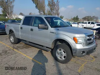 2014 Ford F-150 XL with VIN 1FTFW1EF9EKF99892, listed as a IAAI auction lot 41428456 with 128,659 mi miles and . Bid and sale history available at carsss.com. Image 1.