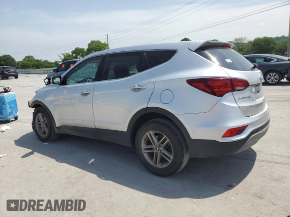 2018 Hyundai Santa Fe 2.4L z VIN 5XYZTDLB5JG551524, wystawiony jako Copart lot #57170985 z przebiegiem 139 248 mil mil oraz Szkoda całkowita • Salvage title. Historia ofert i sprzedaży dostępna na DreamBid. Obrazek 2.