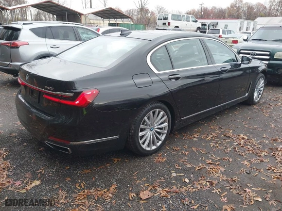2020 BMW 7 Series 740i xDrive with VIN WBA7T4C03LGF97312, listed as a IAAI auction lot 40970033 with 60,231 mi miles. Bid and sale history available at carsss.com. Image 4.