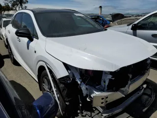 2023 Lexus RX with VIN 2T2BCMEA9PC001667, listed as a Copart auction lot 50518334 with 18,150 mi miles and Salvage Title. Bid and sale history available at carsss.com. Image 4.
