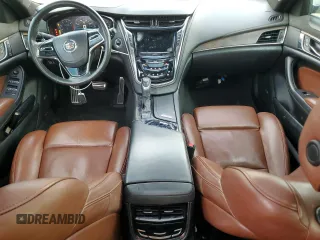 2014 Cadillac CTS Premium RWD z VIN 1G6AT5S30E0142990, wystawiony jako Copart lot #50801685 z przebiegiem 74 583 mil mil oraz Szkody całkowita. Historia ofert i sprzedaży dostępna na DreamBid. Obrazek 8.
