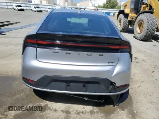2024 Toyota Prius LE z VIN JTDACAAU2R3031040, wystawiony jako Copart lot #57495285 z przebiegiem 5743 mil mil oraz Szkoda całkowita • Salvage title. Historia ofert i sprzedaży dostępna na DreamBid. Obrazek 6.