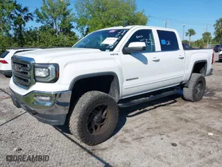 2017 GMC Sierra 1500 SLE with VIN 3GTU2MECXHG367033, listed as a IAAI auction lot 41752539 with 130,419 mi miles. Bid and sale history available at carsss.com. Image 2.