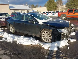2012 Audi A7 Premium Plus with VIN WAUYGAFC2CN086650, listed as a IAAI auction lot 41530779 with 67,150 mi miles and . Bid and sale history available at DreamBid. Image 1.