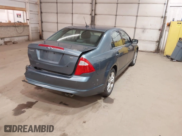 2012 Ford Fusion SE z VIN 3FAHP0HA9CR180004, wystawiony jako IAAI lot #42037384 z przebiegiem 111 262 mil mil oraz . Historia ofert i sprzedaży dostępna na DreamBid. Obrazek 4.