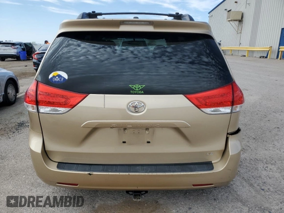 2012 Toyota Sienna LE AAS с VIN 5TDKK3DC6CS276676, выставлен на аукционе Copart как лот 56898135 с пробегом 167 432 миль миль и Списание • Salvage title. История ставок и продаж доступна на DreamBid. Изображение 6.