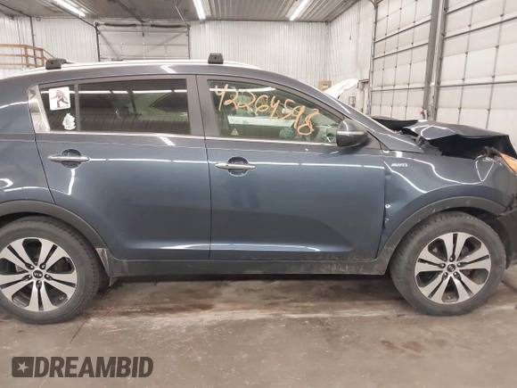 2011 Kia Sportage EX with VIN KNDPCCA27B7037886, listed as a IAAI auction lot 42264598 with 211,538 mi miles and . Bid and sale history available at DreamBid. Image 14.