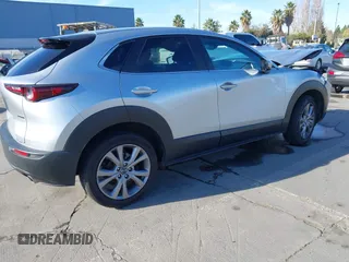 2021 Mazda CX-30 Select with VIN 3MVDMABL9MM256321, listed as a IAAI auction lot 41057613 with Not Provided miles and . Bid and sale history available at DreamBid. Image 4.