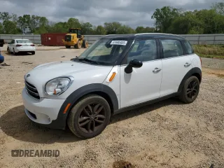 2015 MINI Countryman with VIN WMWZB3C52FWM33204, listed as a Copart auction lot 51680405 with 154,839 mi miles and Salvage Title. Bid and sale history available at DreamBid. Image 1.