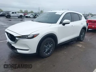 2020 Mazda CX-5 Touring with VIN JM3KFACM0L0738615, listed as a IAAI auction lot 41923923 with 52,599 mi miles. Bid and sale history available at carsss.com. Image 18.