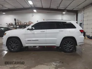 2018 Jeep Grand Cherokee High Altitude with VIN 1C4RJFCG6JC411757, listed as a IAAI auction lot 41591805 with 134,038 mi miles and . Bid and sale history available at DreamBid. Image 14.