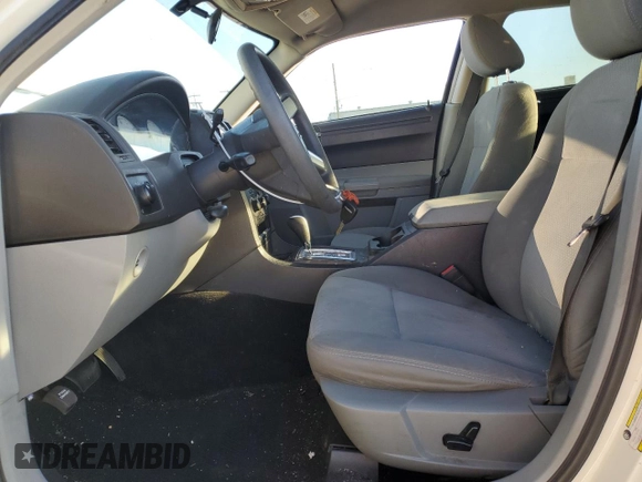 2007 Chrysler 300 with VIN 2C3KA43R77H732806, listed as a Copart auction lot 47111825 with 104,639 mi miles and Salvage Title. Bid and sale history available at DreamBid. Image 7.