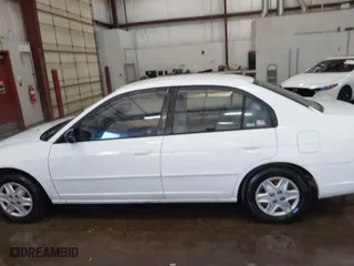 2003 Honda Civic LX with VIN 2HGES16573H598145, listed as a IAAI auction lot 41651885 with 254,523 mi miles. Bid and sale history available at carsss.com. Image 14.