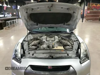 2009 Nissan GT-R Premium с VIN JN1AR54F89M252013, выставлен на аукционе Copart как лот 70656764 с пробегом 66 085 миль миль и Списание • Salvage title. История ставок и продаж доступна на DreamBid. Изображение 9.