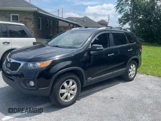 2013 Kia Sorento LX with VIN 5XYKTCA65DG324775, listed as a Copart auction lot 63433705 with 128,031 mi miles and Clean title. Bid and sale history available at DreamBid. Image 2.