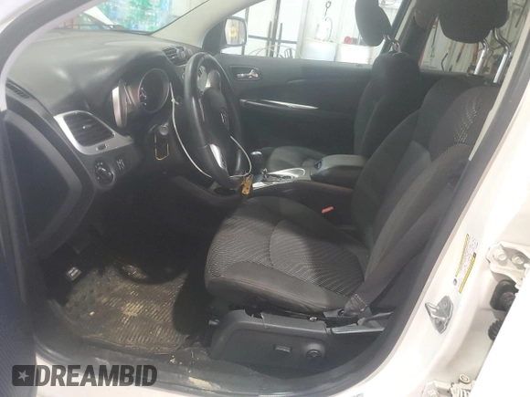 2015 Dodge Journey SXT z VIN 3C4PDCBG5FT726348, wystawiony jako Copart lot #62782925 z przebiegiem 162 652 mil mil oraz Szkoda całkowita • Salvage title. Historia ofert i sprzedaży dostępna na DreamBid. Obrazek 7.