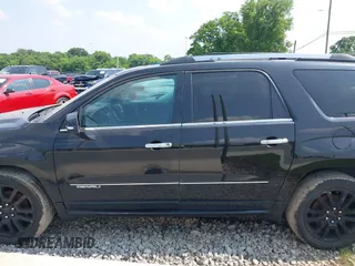 2016 GMC Acadia Denali z VIN 1GKKVTKD2GJ170199, wystawiony jako IAAI lot #42400004 z przebiegiem 155 556 mil mil oraz . Historia ofert i sprzedaży dostępna na DreamBid. Obrazek 14.