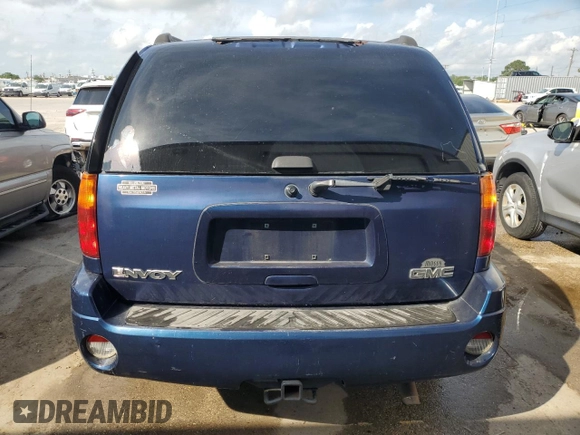 2004 GMC Envoy SLE with VIN 1GKDS13S842402250, listed as a Copart auction lot 54941005 with 163,380 mi miles and Salvage Title. Bid and sale history available at DreamBid. Image 6.