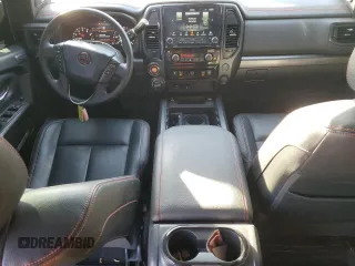 2024 Nissan Titan Pro-4X with VIN 1N6AA1ED5RN101017, listed as a Copart auction lot 43777785 with 30,489 mi miles and Salvage title. Bid and sale history available at DreamBid. Image 8.