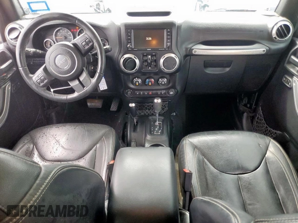 2015 Jeep Wrangler Unlimited Rubicon Hard Rock with VIN 1C4HJWFG1FL710264, listed as a Copart auction lot 54123285 with 96,737 mi miles and Salvage title. Bid and sale history available at DreamBid. Image 8.