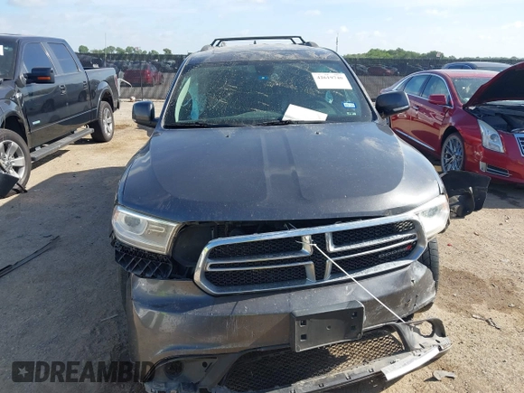 2014 Dodge Durango Limited with VIN 1C4RDHDG6EC277775, listed as a IAAI auction lot 42619740 with 206,936 mi miles and . Bid and sale history available at DreamBid. Image 12.