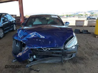 2017 Tesla Model S 100D z VIN 5YJSA1E21HF190815, wystawiony jako IAAI lot #42422004 z przebiegiem 99 938 mil mil oraz . Historia ofert i sprzedaży dostępna na DreamBid. Obrazek 13.