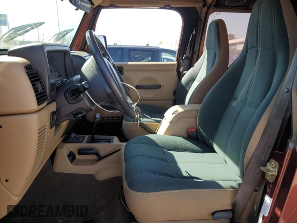 2002 Jeep Wrangler Sahara with VIN 1J4FA59S92P708647, listed as a Copart auction lot 74851654 with 131,794 mi miles and Salvage Title. Bid and sale history available at carsss.com. Image 7.