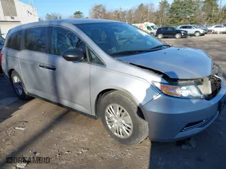 2014 Honda Odyssey LX with VIN 5FNRL5H24EB001131, listed as a IAAI auction lot 41753911 with 238,080 mi miles. Bid and sale history available at carsss.com. Image 1.