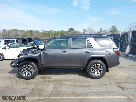 2021 Toyota 4Runner TRD Off Road with VIN JTEPU5JR0M5877962, listed as a IAAI auction lot 41683297 with 61,539 mi miles. Bid and sale history available at carsss.com. Image 14.