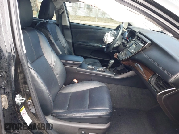 2014 Toyota Avalon Limited with VIN 4T1BK1EB2EU103936, listed as a IAAI auction lot 41703894 with 104,657 mi miles. Bid and sale history available at carsss.com. Image 5.