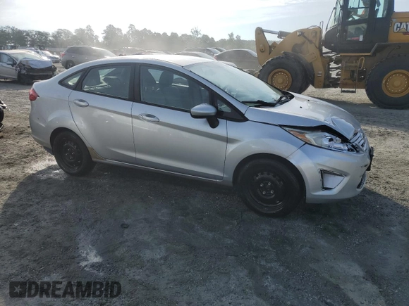 2013 Ford Fiesta S z VIN 3FADP4AJ9DM140665, wystawiony jako Copart lot #61634485 z przebiegiem 165 124 mil mil oraz Szkoda całkowita • Salvage title. Historia ofert i sprzedaży dostępna na DreamBid. Obrazek 4.
