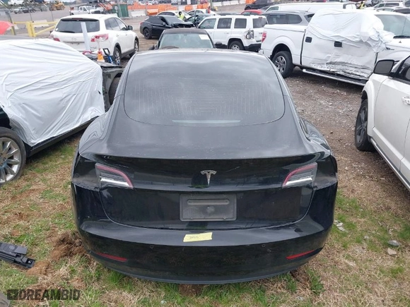 2019 Tesla Model 3 Mid Range with VIN 5YJ3E1EA2KF317028, listed as a IAAI auction lot 41781580 with 107,496 mi miles. Bid and sale history available at carsss.com. Image 16.