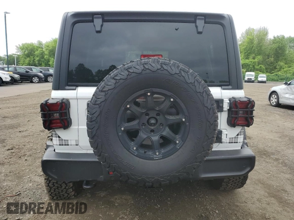 2022 Jeep Wrangler Unlimited Sport S with VIN 1C4HJXDG4NW235781, listed as a Copart auction lot 57184895 with 30,883 mi miles and Salvage title. Bid and sale history available at DreamBid. Image 6.