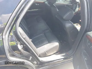 2006 Cadillac DTS 1SE with VIN 1G6KD57976U126634, listed as a IAAI auction lot 41972104 with 148,992 mi miles and . Bid and sale history available at DreamBid. Image 8.