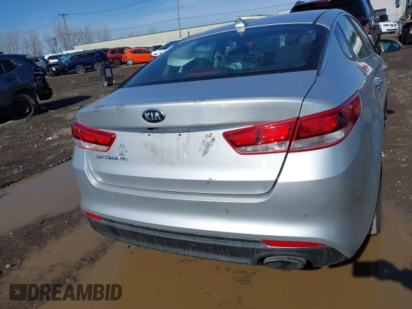 2016 Kia Optima LX with VIN 5XXGT4L34GG078857, listed as a IAAI auction lot 41819971 with 112,963 mi miles. Bid and sale history available at carsss.com. Image 16.
