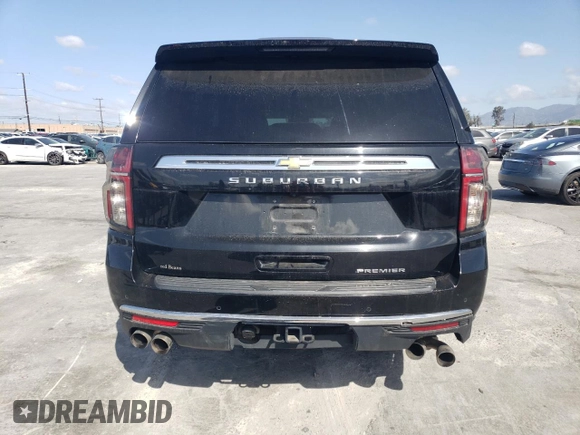 2023 Chevrolet Suburban Premier with VIN 1GNSKFKD8PR205665, listed as a Copart auction lot 51694655 with 27,882 mi miles and Salvage title. Bid and sale history available at DreamBid. Image 6.