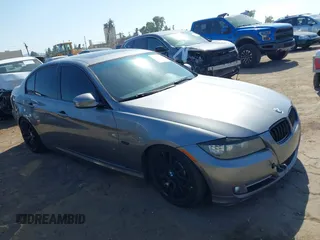 2011 BMW 3 Series 335i with VIN WBAPM5C59BE576258, listed as a IAAI auction lot 37578623 with 140,040 mi miles. Bid and sale history available at carsss.com. Image 1.