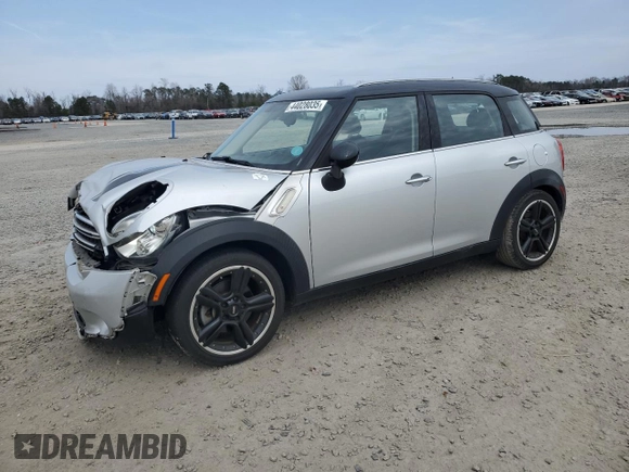 2016 MINI Countryman with VIN WMWZB3C50GWR48610, listed as a Copart auction lot 44028035 with 69,801 mi miles and Salvage title. Bid and sale history available at DreamBid. Image 1.
