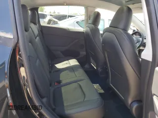 2023 Tesla Model Y Performance z VIN 7SAYGDEFXPF948763, wystawiony jako Copart lot #50562134 z przebiegiem 948 mil mil oraz Szkoda całkowita • Salvage title. Historia ofert i sprzedaży dostępna na DreamBid. Obrazek 10.