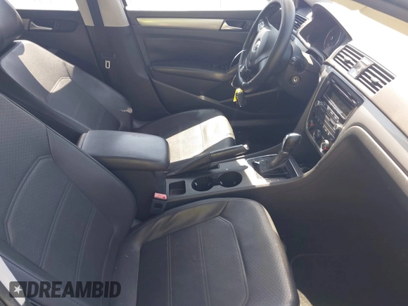 2014 Volkswagen Passat Wolfsburg Edition with VIN 1VWAT7A36EC045573, listed as a IAAI auction lot 41998740 with 151,633 mi miles and . Bid and sale history available at DreamBid. Image 5.