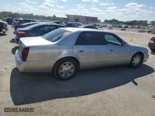 2005 Cadillac DeVille with VIN 1G6KD54Y45U233957, listed as a Copart auction lot 69169463 with 141,675 mi miles and Salvage Title. Bid and sale history available at carsss.com. Image 3.
