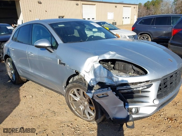 2018 Porsche Macan with VIN WP1AA2A50JLB09807, listed as a IAAI auction lot 41634432 with 74,357 mi miles. Bid and sale history available at carsss.com. Image 1.
