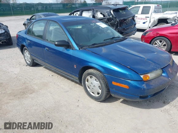 2002 Saturn SL z VIN 1G8ZG52822Z132267, wystawiony jako IAAI lot #41906634 z przebiegiem 144 001 mil mil oraz . Historia ofert i sprzedaży dostępna na DreamBid. Obrazek 1.