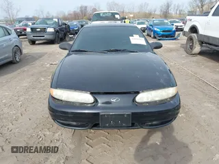 2004 Oldsmobile Alero GX z VIN 1G3NK52F44C107863, wystawiony jako IAAI lot #42018564 z przebiegiem 128 534 mil mil oraz . Historia ofert i sprzedaży dostępna na DreamBid. Obrazek 13.