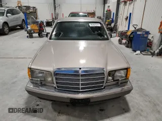 1990 Mercedes-Benz 560 with VIN WDBCA39E7LA517710, listed as a Copart auction lot 85307074 with 225,233 mi miles and Salvage Title. Bid and sale history available at DreamBid. Image 5.